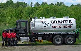 The Grant's with their pumping truck in Hopedale MA